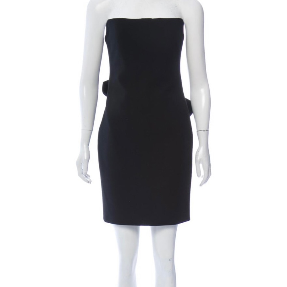 Victoria Beckham wool mini dress with concealed zip and tie closure at back.
